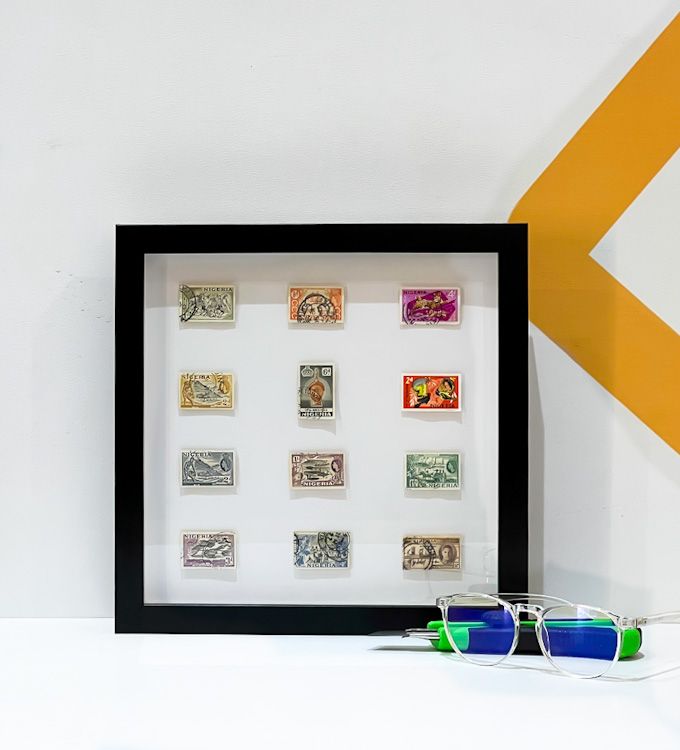 Collection of stamps in a glass frame