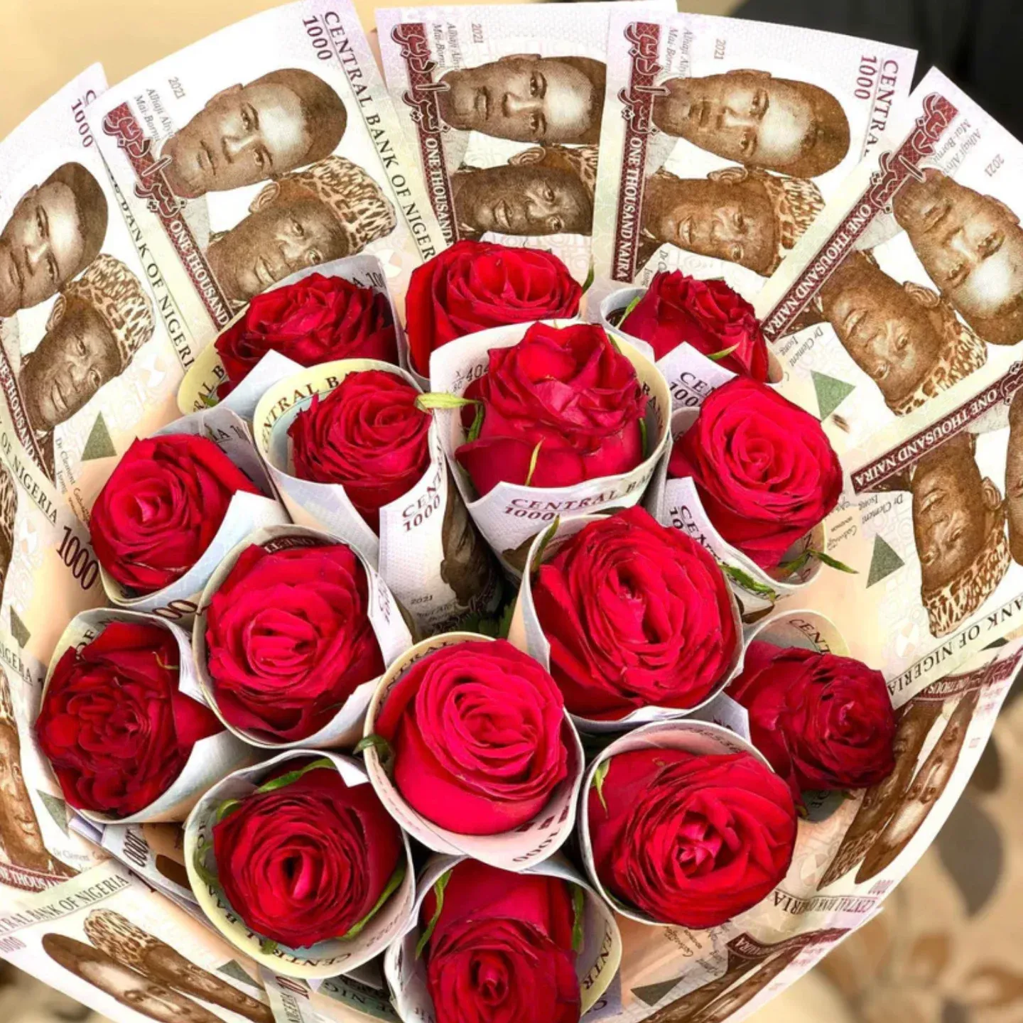 Bouquet of roses wrapped with one thousand Naira notes